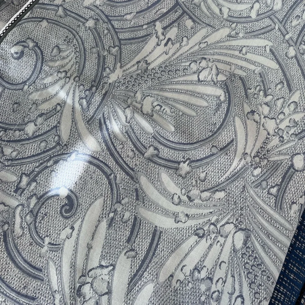 A pair of standard Yves Delorme pillow shams.